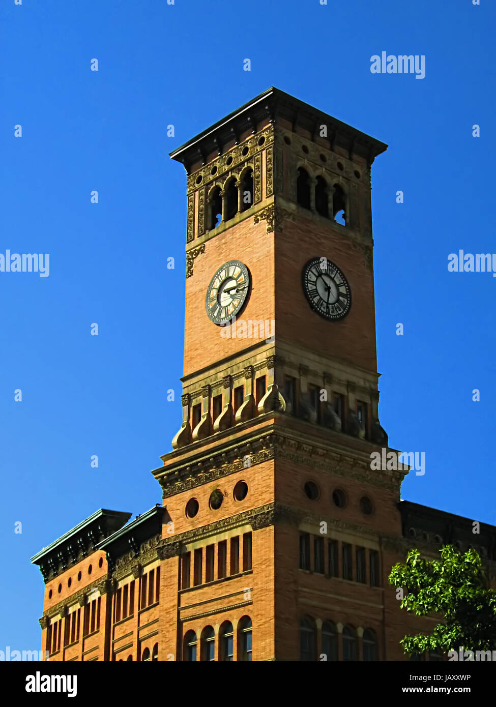 A photograph of a clock tower on a government building detailing its