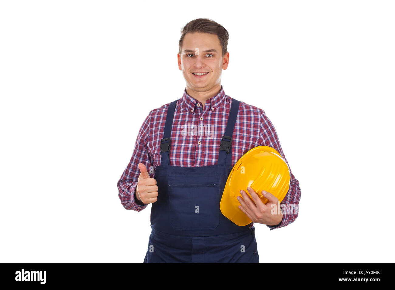 Picture of a smiling young engineer showing thumbs up Stock Photo - Alamy