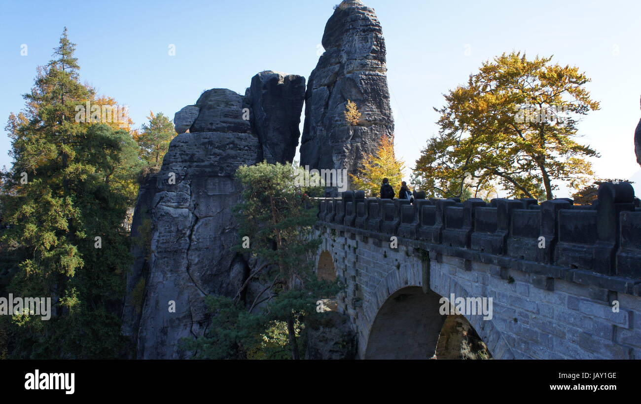 Blick auf die Basteibrücke in der Sächsischen Schweiz in Deutschland; sonniger Tag im Herbst;  View on the Bastei-Bridge in Saxon Switzerland in Germany; a sunny autumn day; Stock Photo