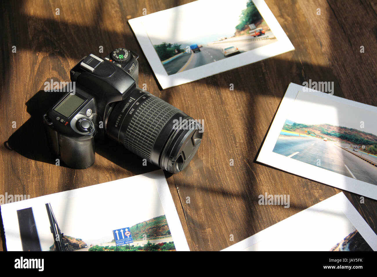 Top view with SLR camera and travel pictures Stock Photo
