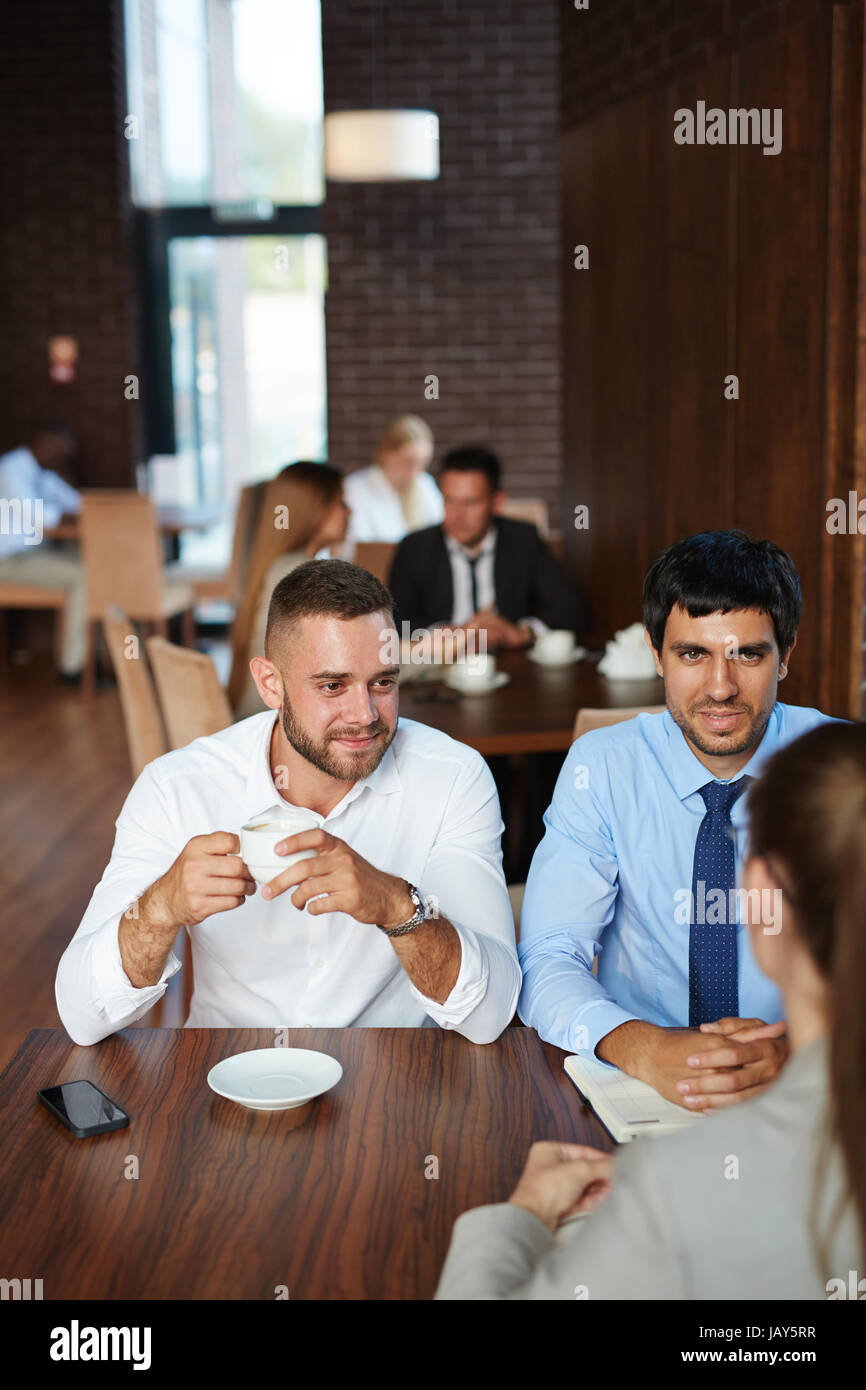 Having Job Interview in Cafe Stock Photo