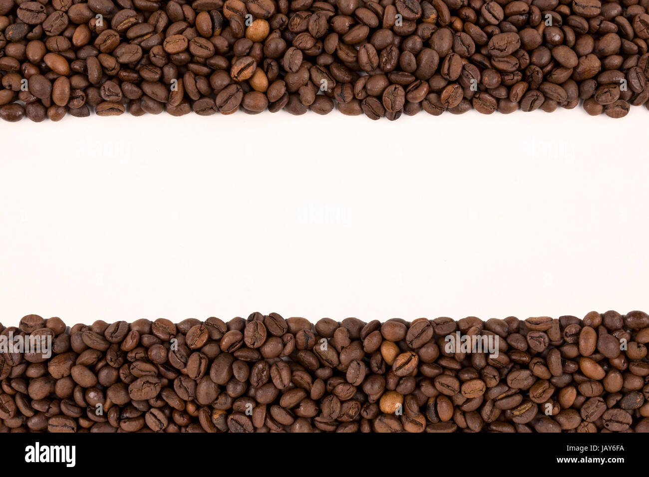 coffee beans on a white background Stock Photo - Alamy