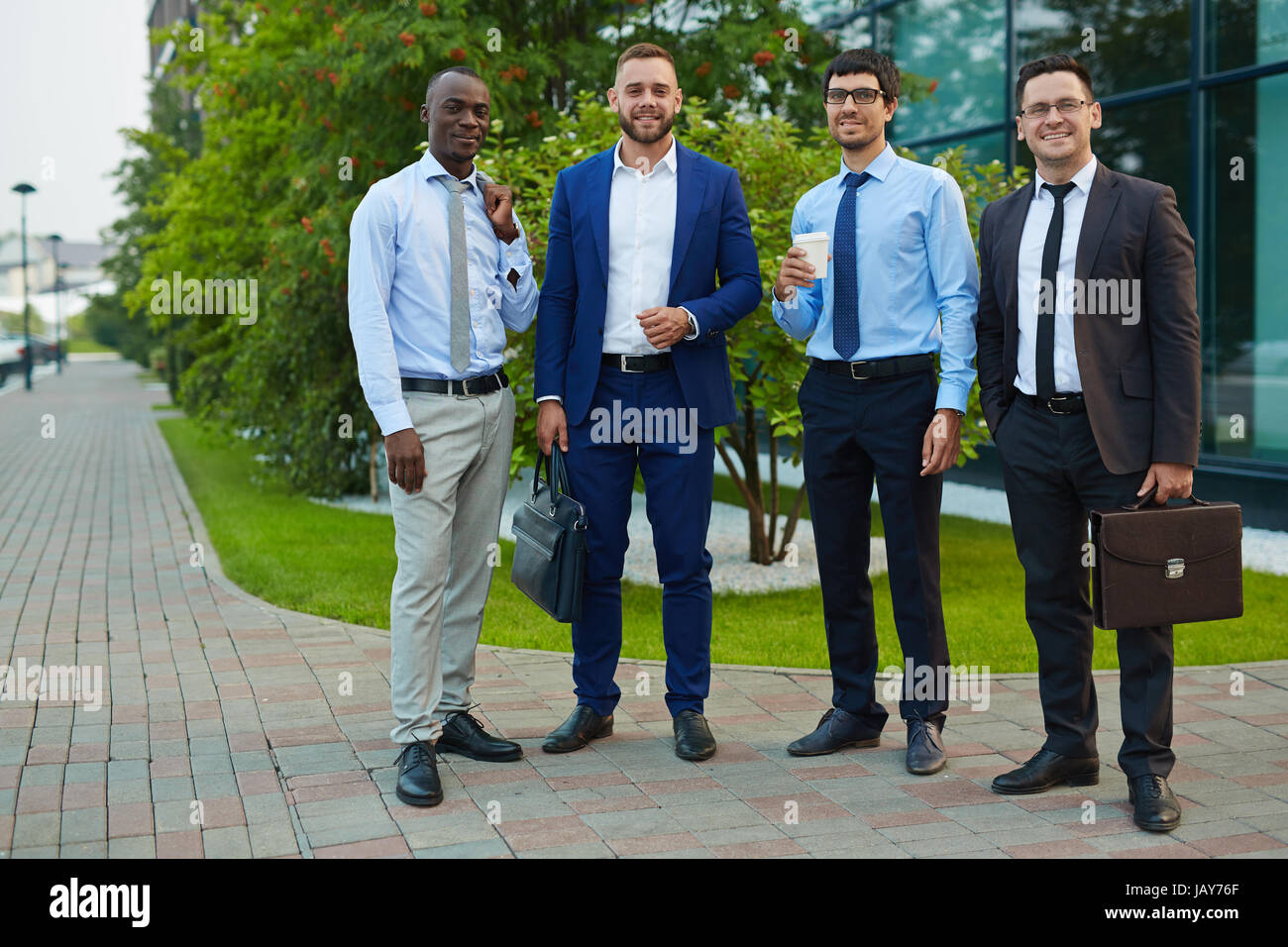 Portrait of Smiling Entrepreneurs Stock Photo - Alamy