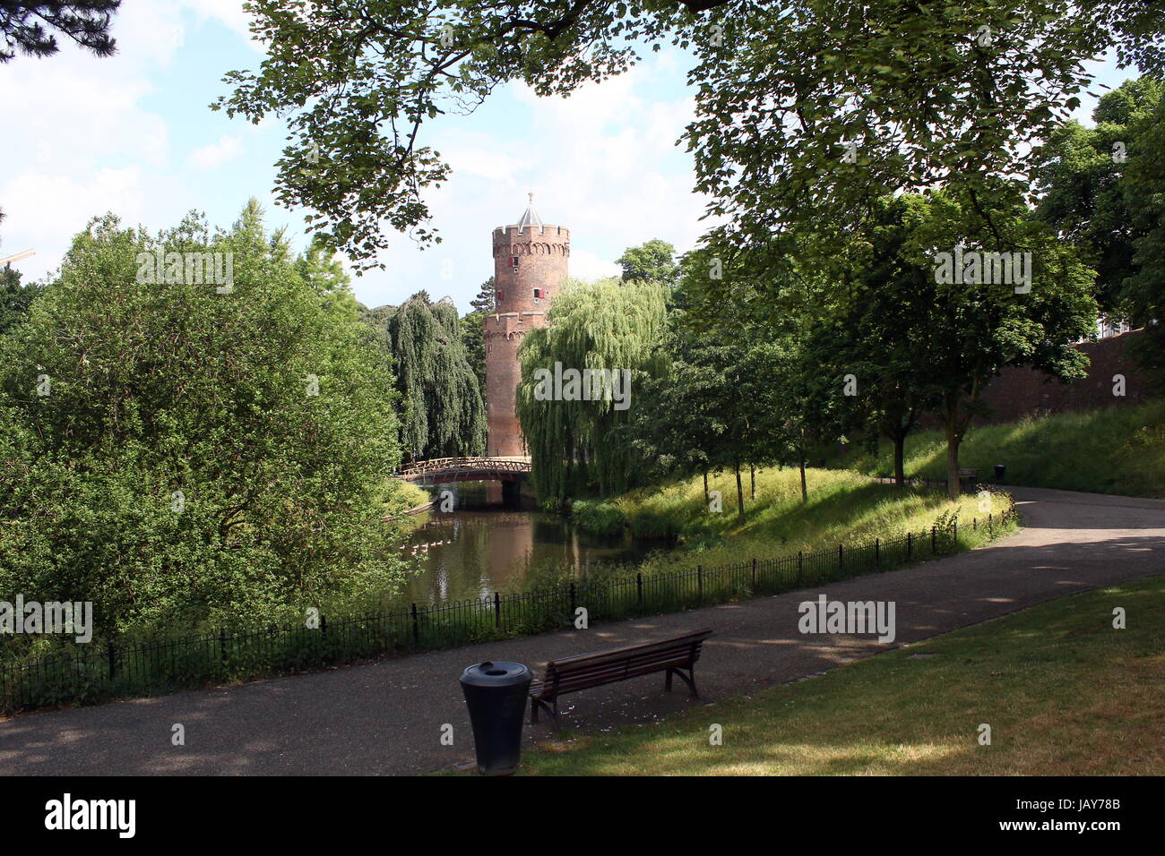 Kronenburgerpark in centre of Nijmegen, Netherlands, with 30m high Kruittoren (1426), part of the former medieval city ramparts Stock Photo