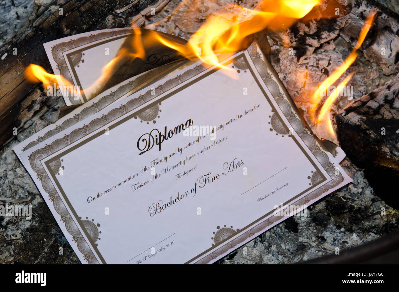 Burning Diploma Stock Photo