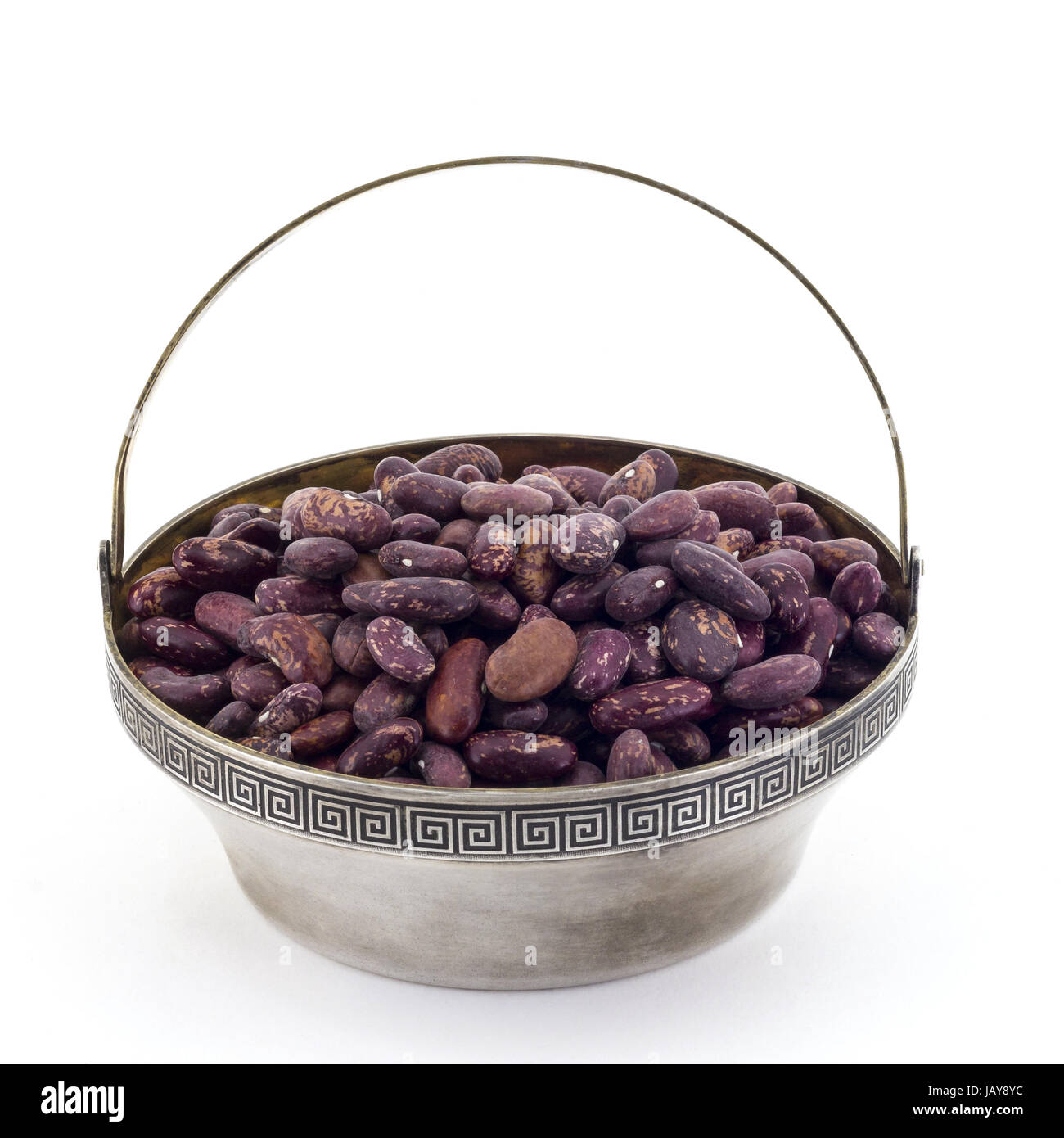Red beans in antique silver bowl isolated on white background Stock Photo