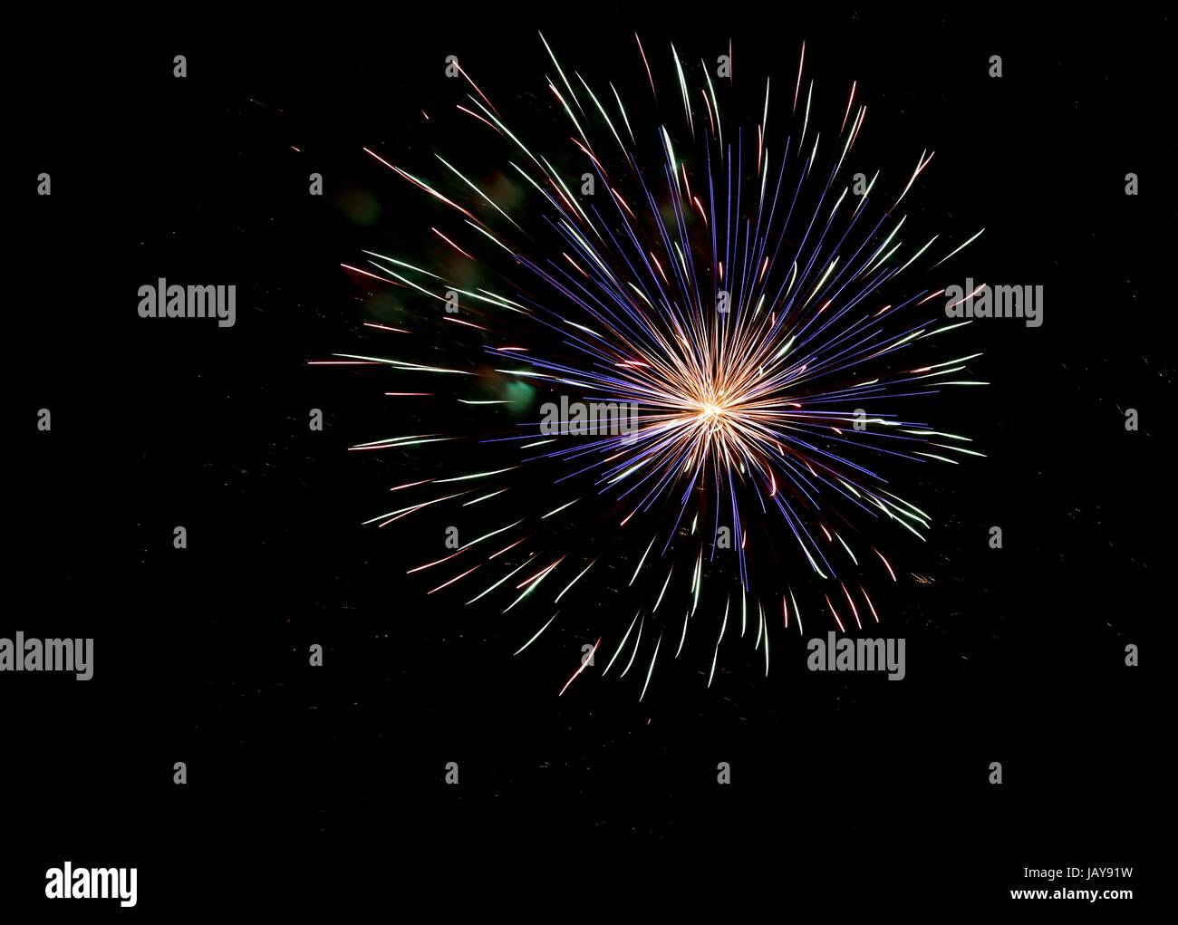 Dramatic Display Exploding All Over Colorful fireworks burst across hi-res stock photography and images - Alamy