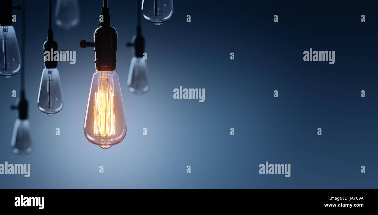 Innovation And Leadership Concept - Glowing Bulb On Among Bulbs Off Stock Photo