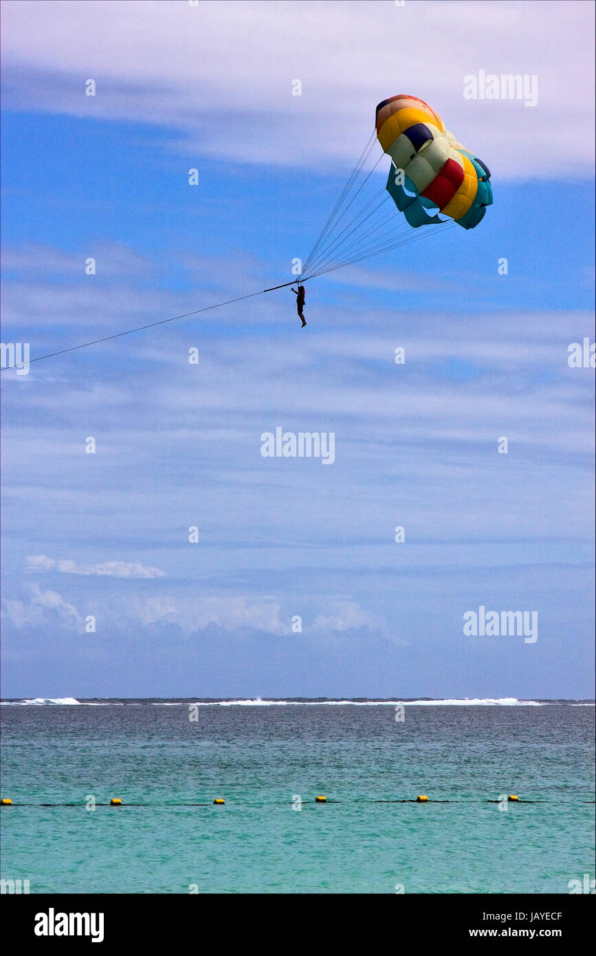 parachute mauritius belle mare water skiing in the indian ocean Stock Photo