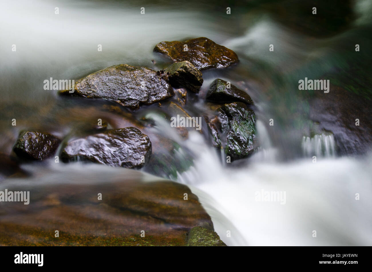 Rocks in Stream Stock Photo - Alamy