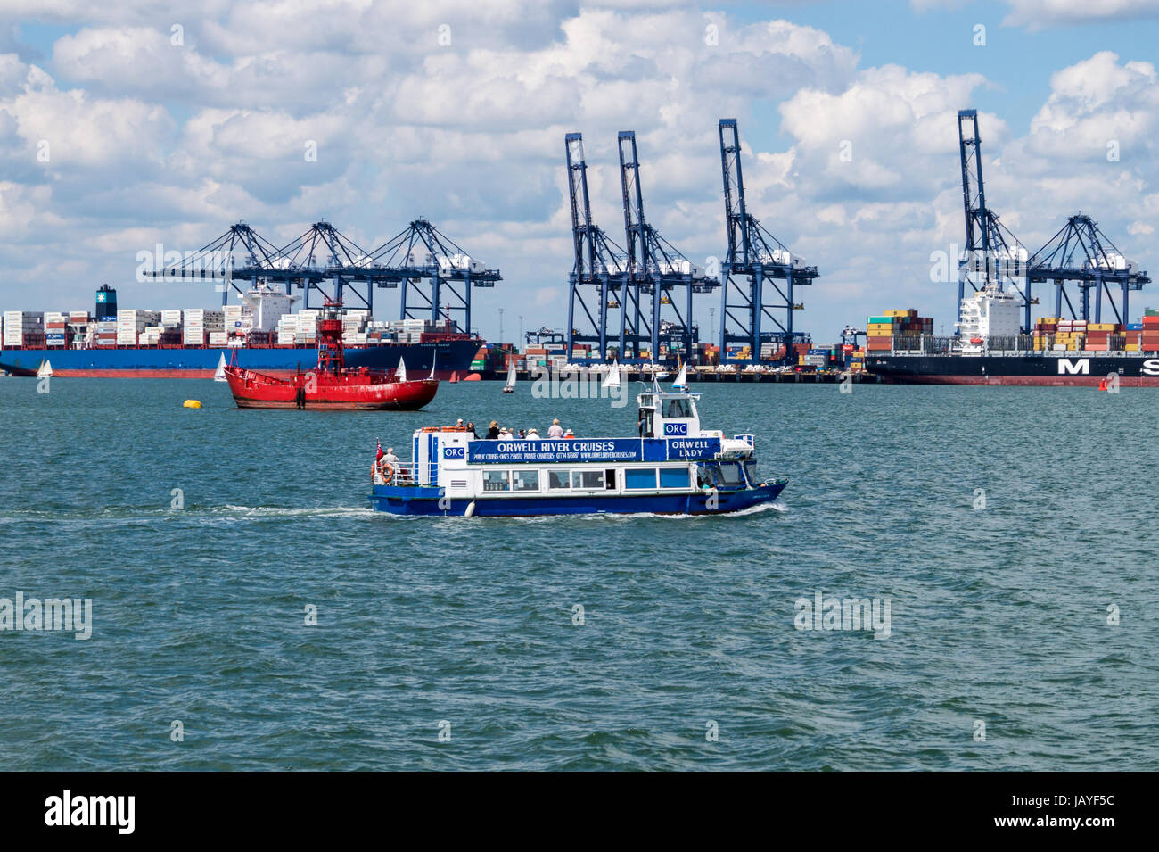 'Orwell Lady' sightseeing cruise boat, and Felixstowe container port, seen from Harwich Essex England Stock Photo