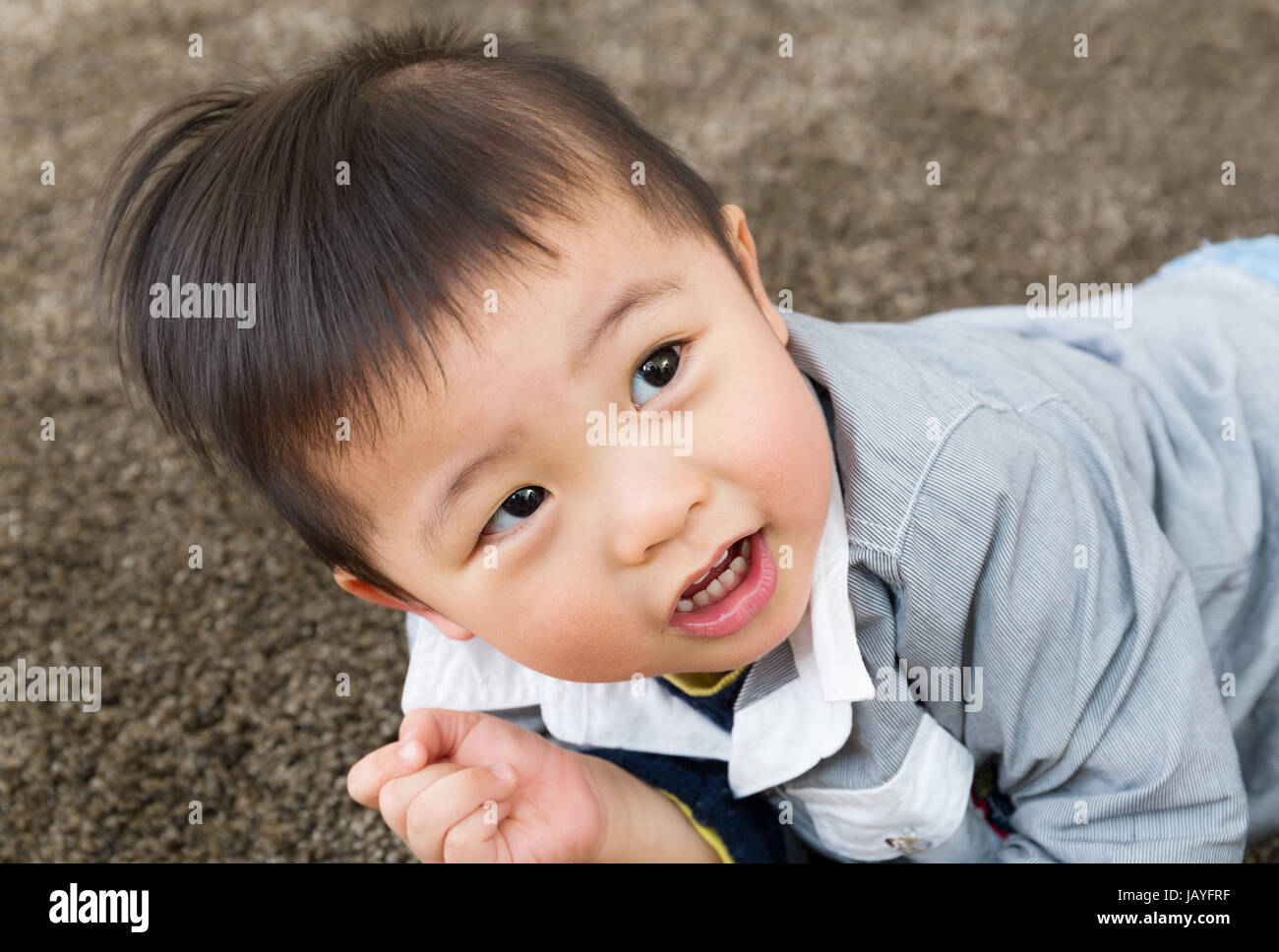 Little boy creep on carpet Stock Photo Alamy