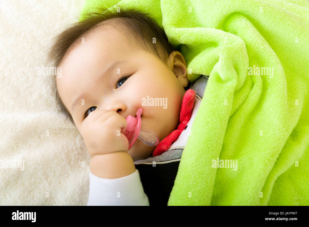 Baby bite pacifier Stock Photo Alamy