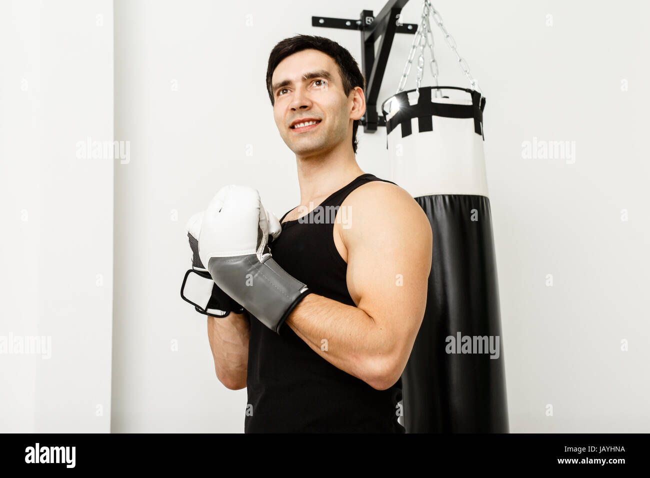 Athletic man wearing a white Boxing glove Stock Photo Alamy