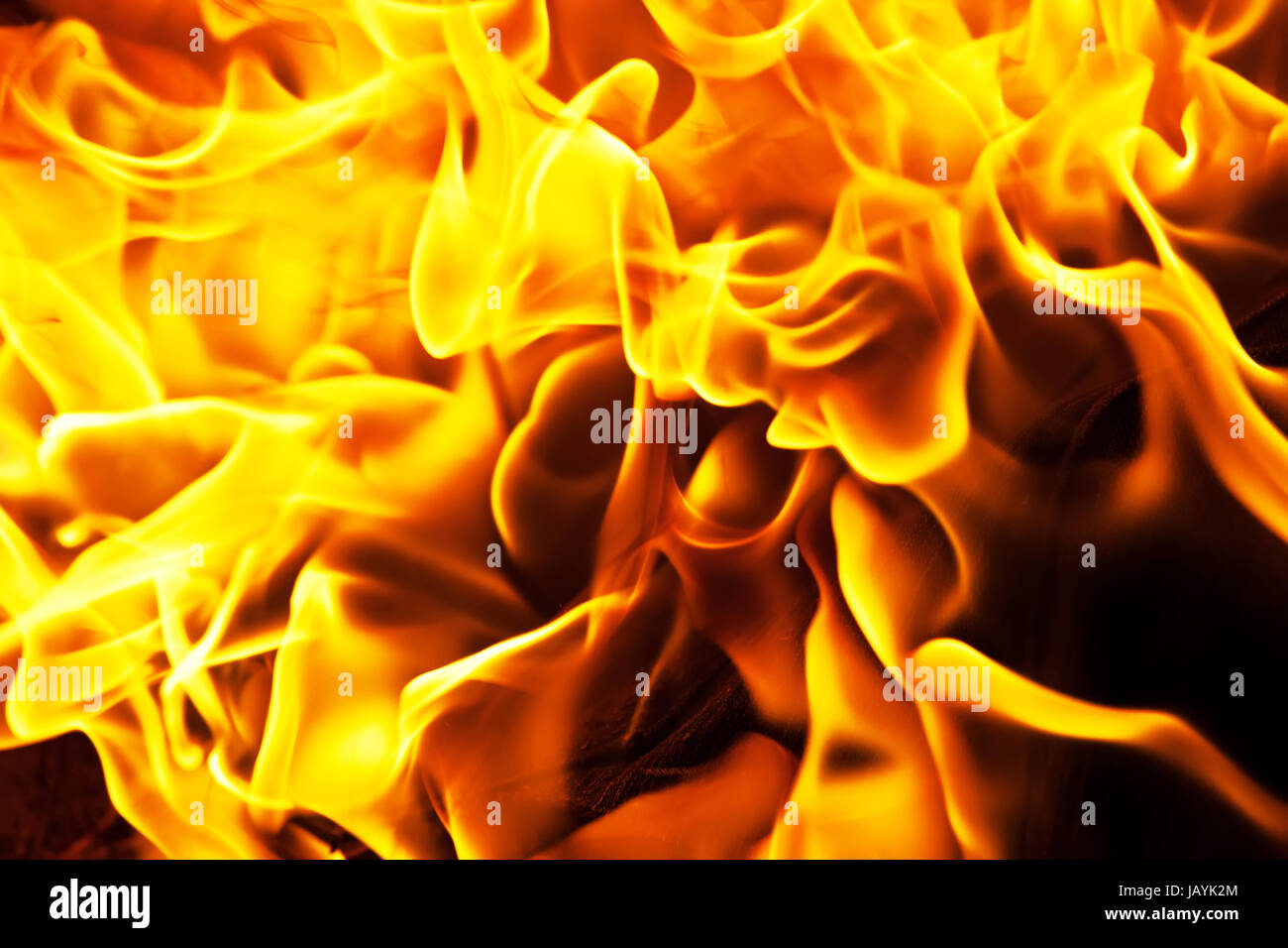 Beautiful yellow and orange hot fire on black background Stock Photo ...