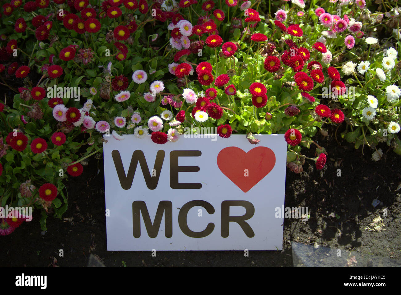 we love Manchester tribute flowers sign Square Glasgow Stock