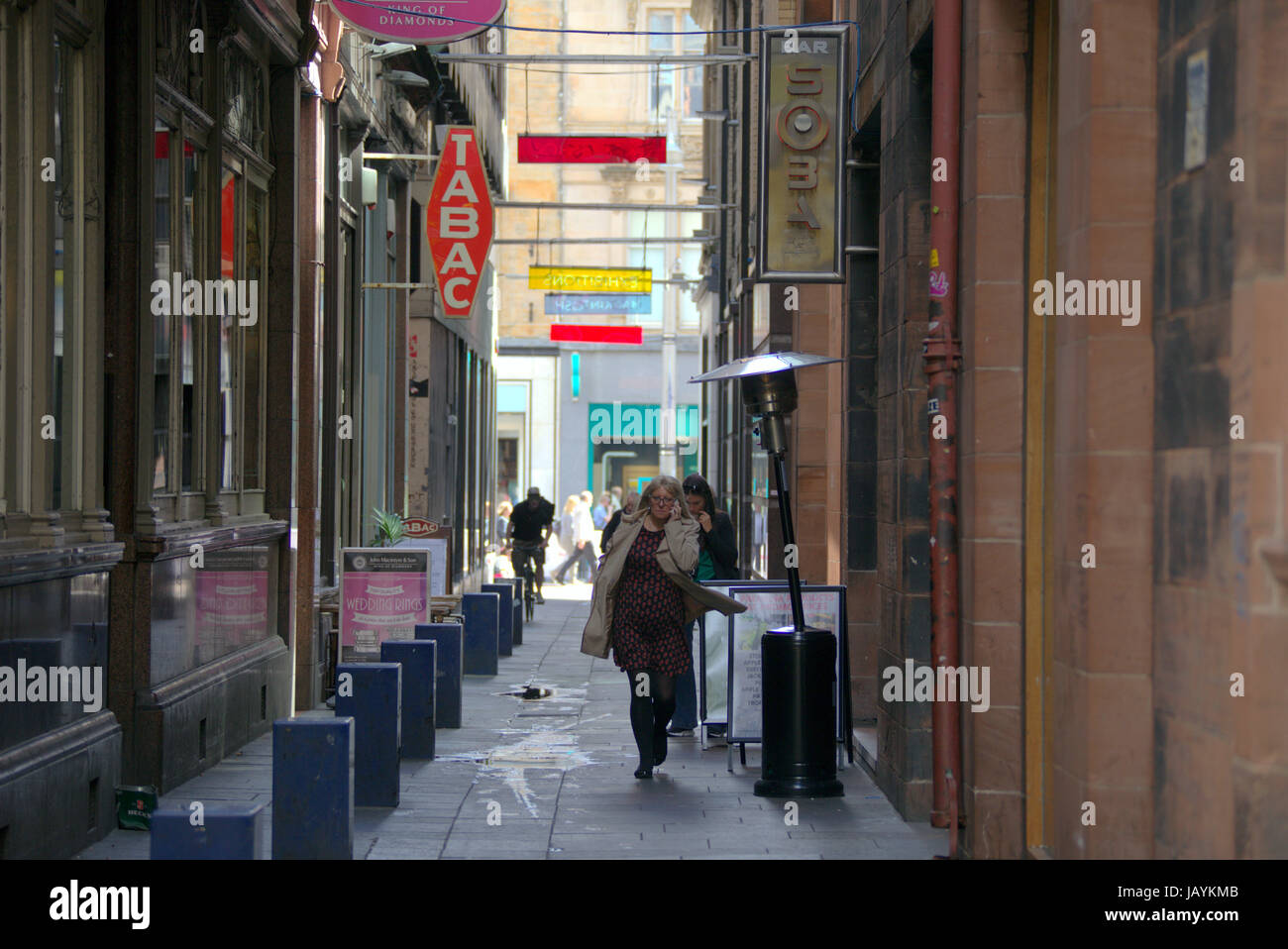 Mitchell Lane home of the lighthouse in Glasgow also has pubs and restaurants with  a neon light display Stock Photo