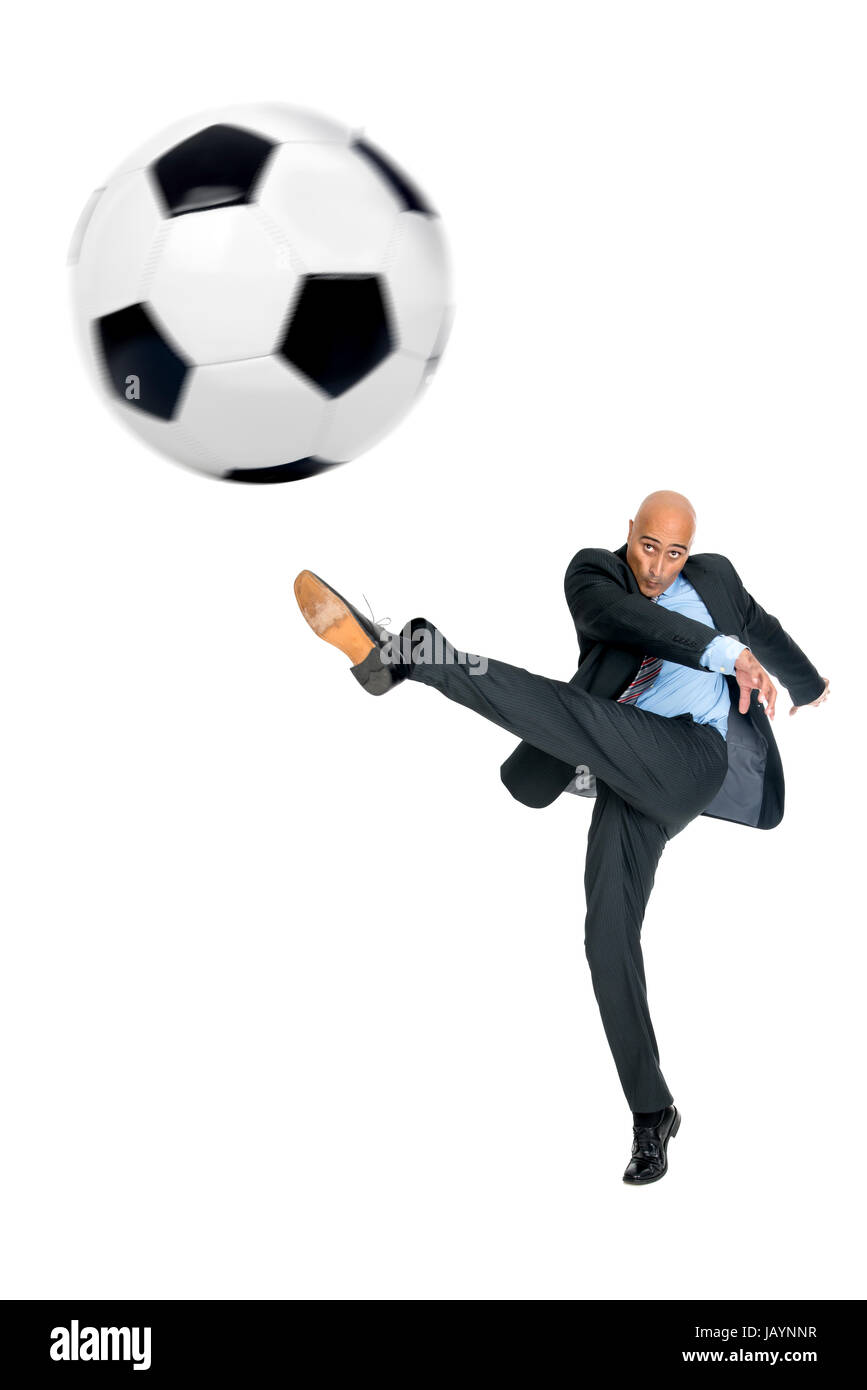 Businessman playing soccer ball isolated in white Stock Photo - Alamy