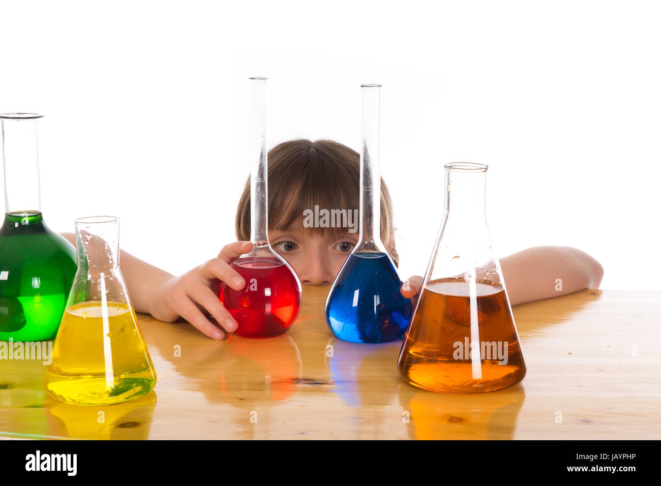 school girl doing chemistry science experiment Stock Photo