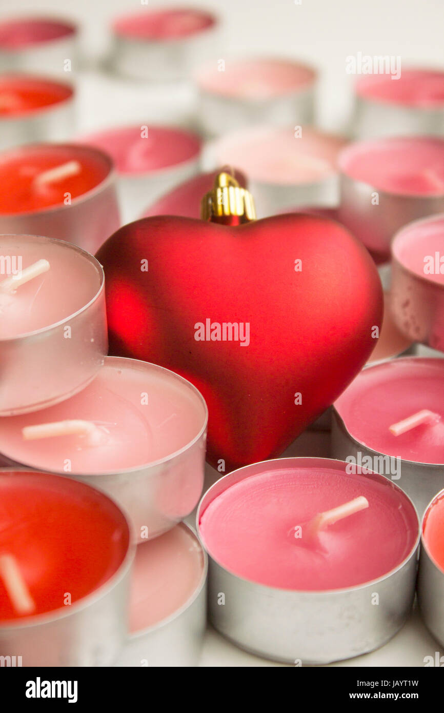 Different colors of candles in a indoor composition Stock Photo Alamy