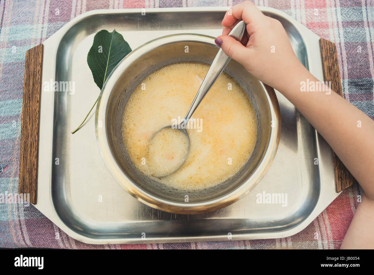 Child eating soup Stock Photo - Alamy