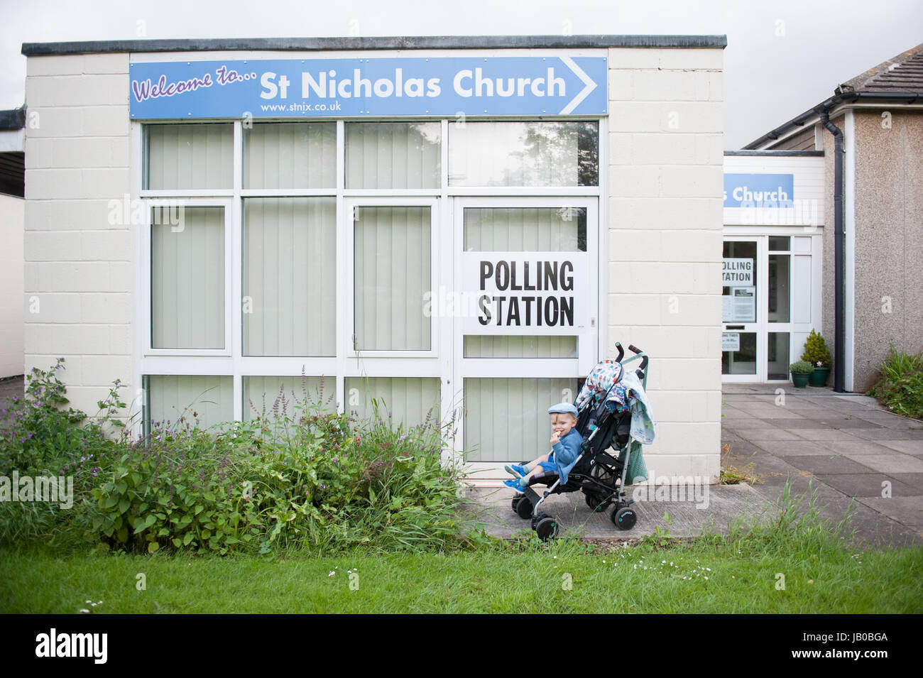 UK Election: Toddler waiting at Polling Station in Yate, North Bristol Stock Photo