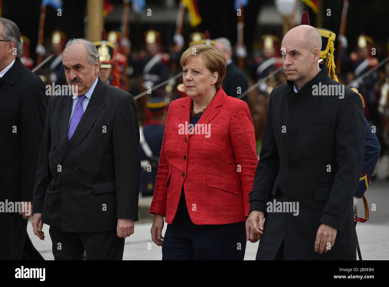 Buenos Aires, Argentina. 8th June, 2017. Chancellor of Germany Angela Merkel (C), the Mayor of Buenos Aires Horacio Rodriguez Larreta (R) and the Vice Minister of foreign affairs Pedro Villagra Delgado (L) during a wreath-laying ceremony at the Plaza San Martin square in Buenos Aires, Argentina. Credit: Anton Velikzhanin/Alamy Live News Stock Photo