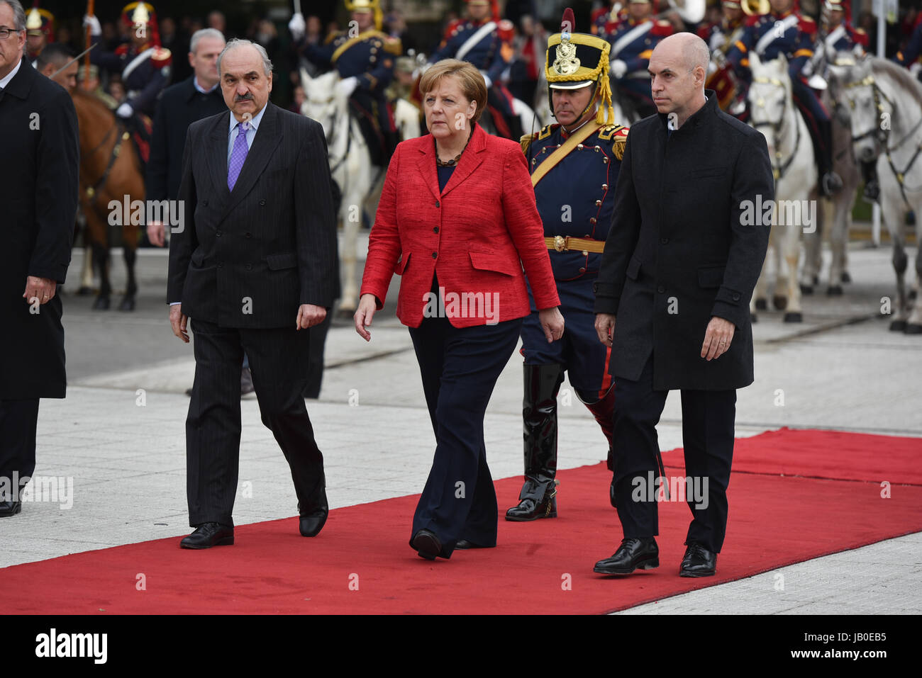 Buenos Aires, Argentina. 8th June, 2017. Chancellor of Germany Angela Merkel (C), the Mayor of Buenos Aires Horacio Rodriguez Larreta (R) and the Vice Minister of foreign affairs Pedro Villagra Delgado (L) during a wreath-laying ceremony at the Plaza San Martin square in Buenos Aires, Argentina. Credit: Anton Velikzhanin/Alamy Live News Stock Photo