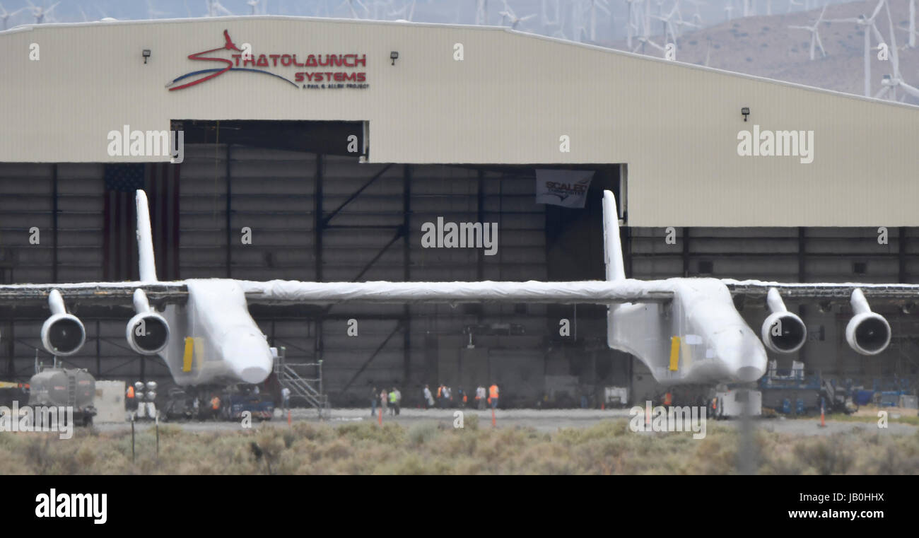May 31, 2017 - Mojave, California, U.S. - Paul Allen's Stratolaunch carrier makes it's first out of the hanger appearance Wednesday. The Stratolaunch was rolled out to start fuel testing on it's tanks. The plane is built by Scaled Composites and called the ''Roc, '' The plane has the longest wingspan of any aircraft ever built: 385 feet from tip to tip. The six-engine mothership is designed to carry rockets between its two fuselages. Once at altitude, the mega-plane will drop the launch vehicle, which will then fire its boosters and launch to space from the air. (Credit Image: © Gene Blevins v Stock Photo