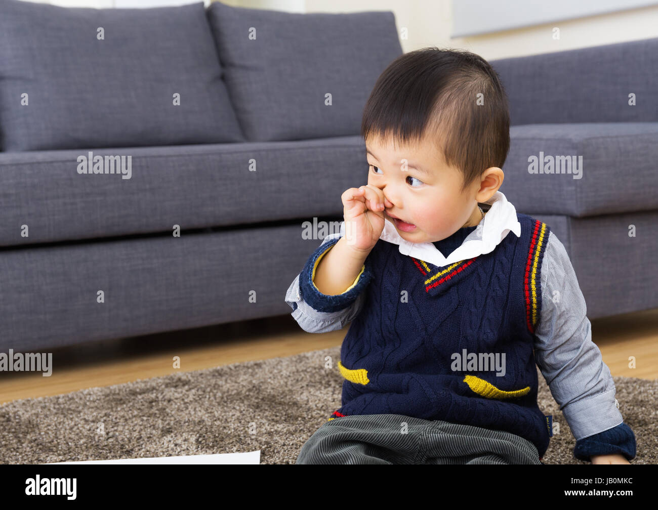 Little boy picking nose Stock Photo