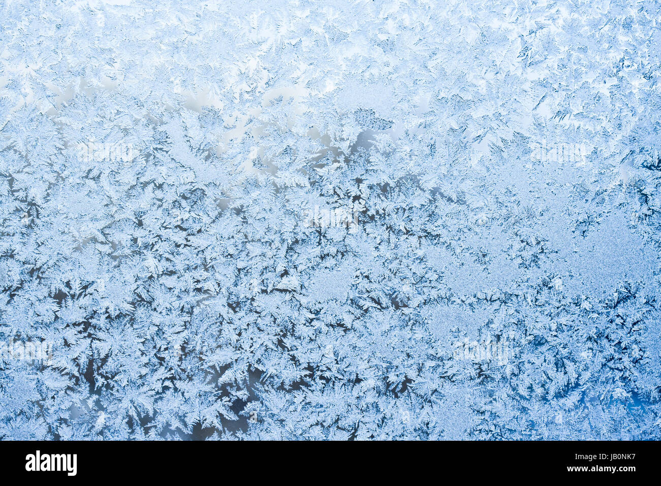 Beautiful pattern of frost on winter window Stock Photo - Alamy
