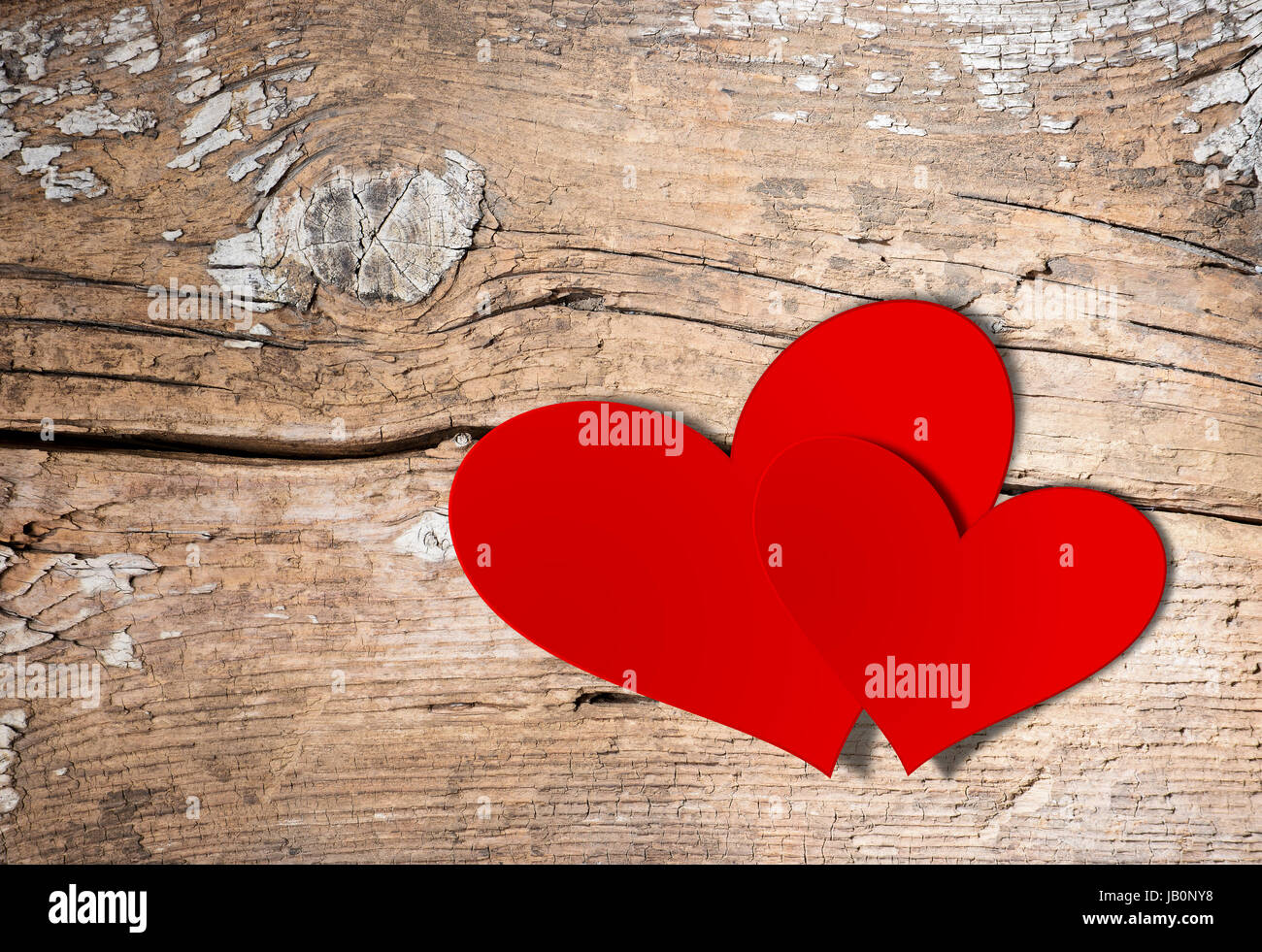 Valentines Vintage Handmade Couple Hearts over Wooden Background. Stock Photo