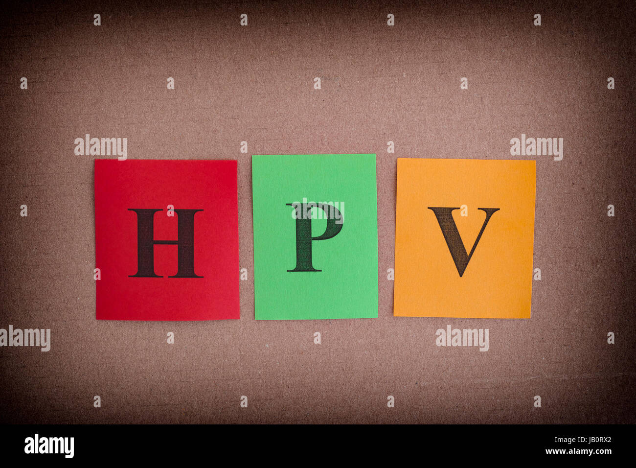 HPV (Human Papillomavirus). Colorful paper notes with abbreviation HPV. Stock Photo