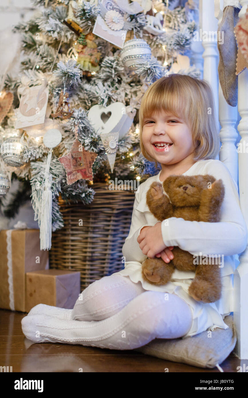 Smiling pretty girl sits in hi-res stock photography and images - Alamy
