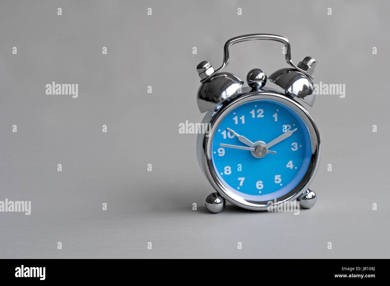 clock hand alarm clock Stock Photo Alamy