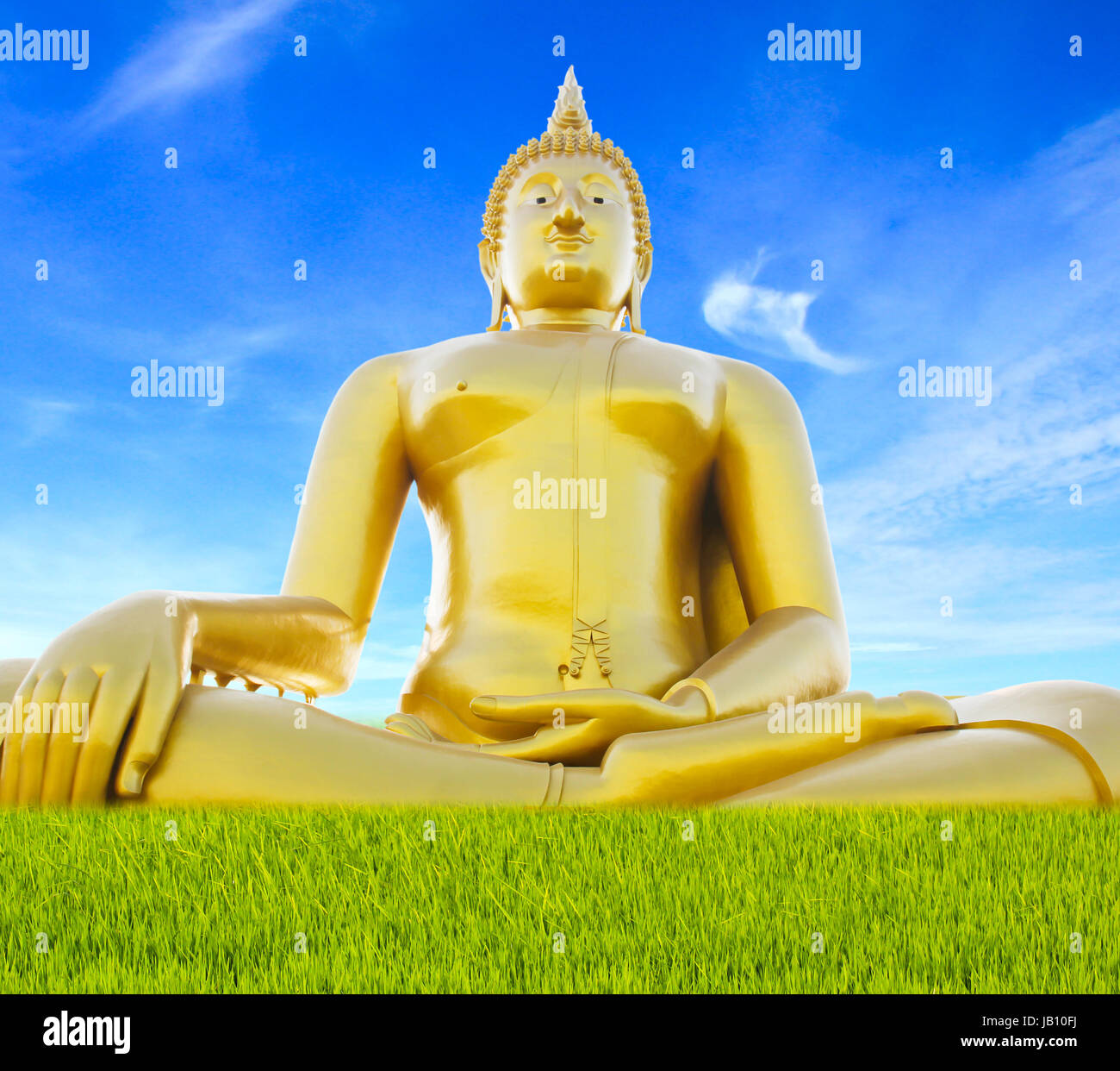 Big golden buddha statue against sky Stock Photo - Alamy