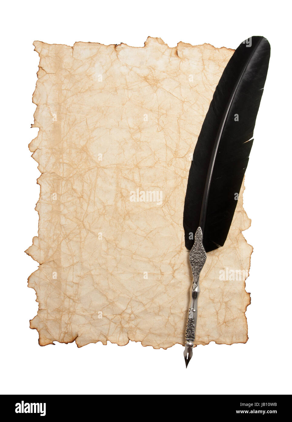 Feather pen and ink bottle on old paper background Stock Photo - Alamy