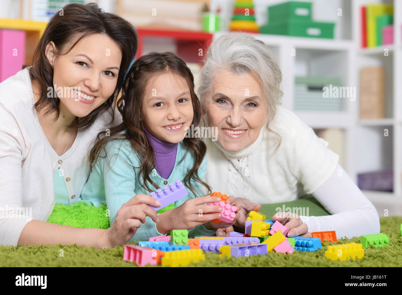 girl with mother and grandmother Stock Photo - Alamy