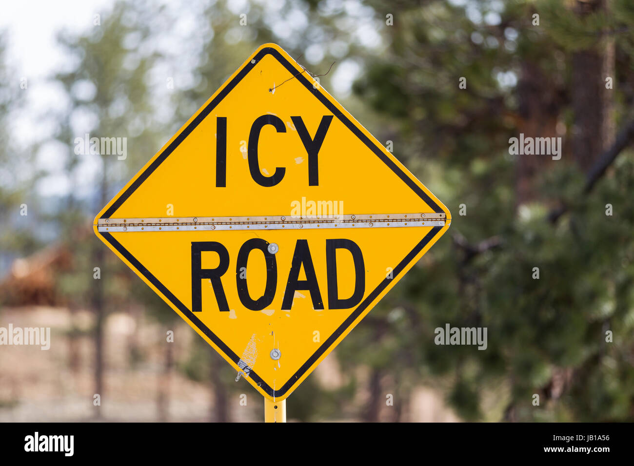 Yellow warning sign, Icy Road, United States Stock Photo Alamy