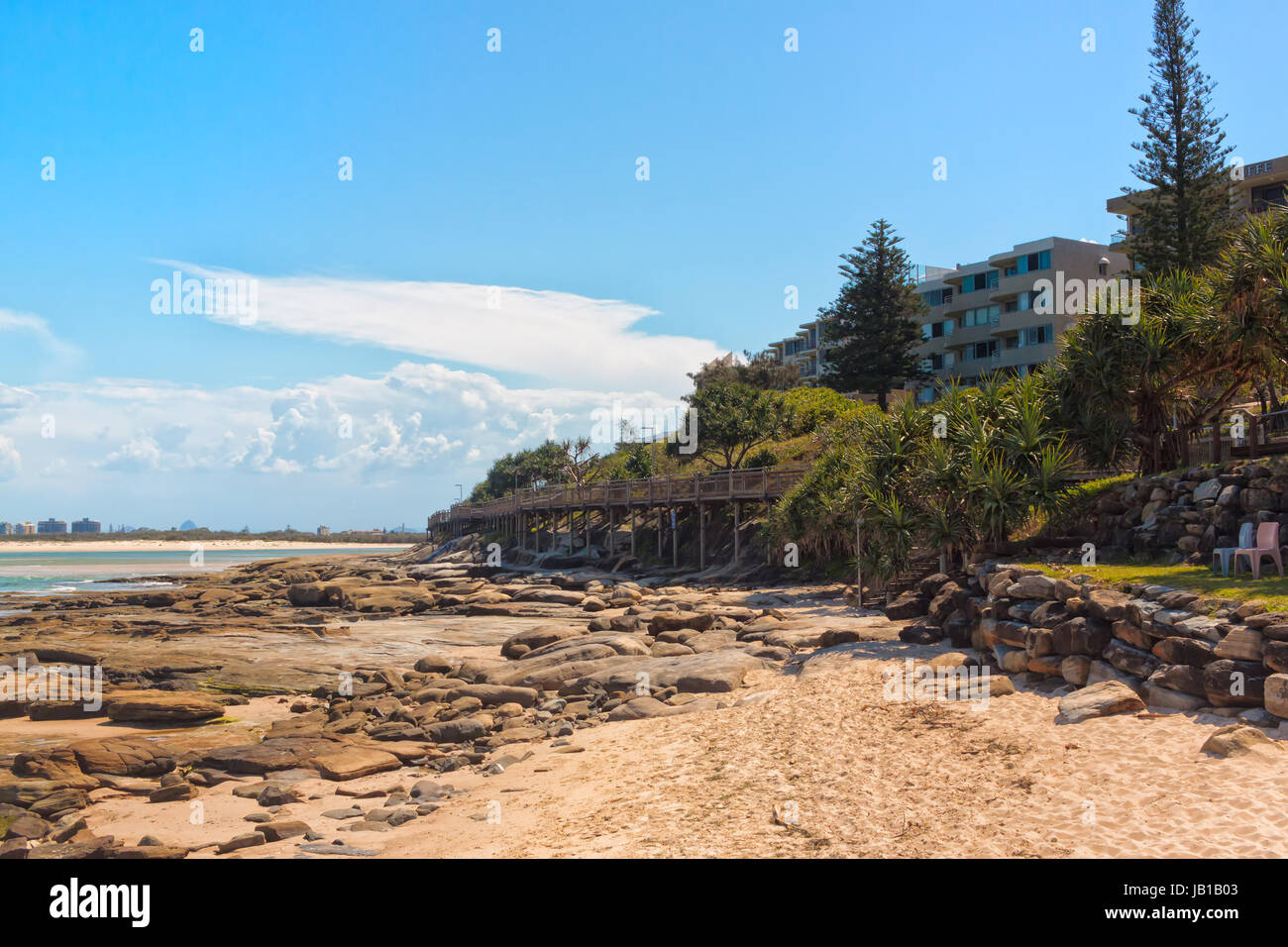 Someone has set up a personal viewing point on the beach at Caloundra, Queensland, Australia. Those plastic chairs invite you to just admire the beaut Stock Photo