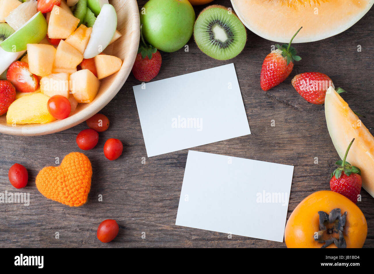 Kitchen Table With Colorful Variety Of Fruits On Wood Plate