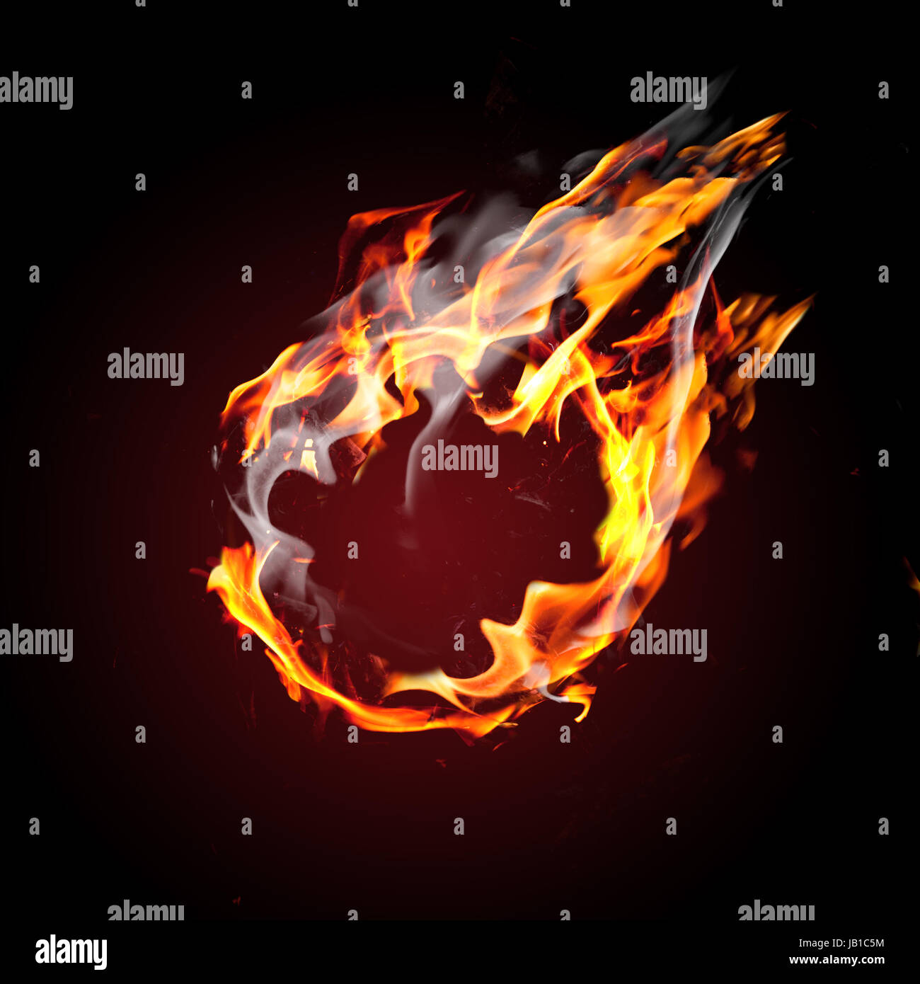 Blank ball on fire Stock Photo - Alamy