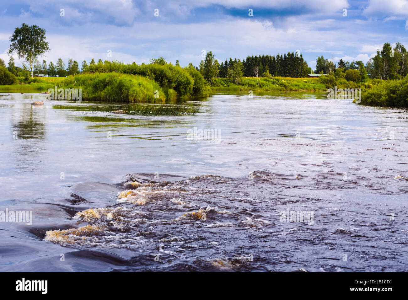 A beautiful summer day by the river Pyhajoki in the Nortern Finland. Stock Photo