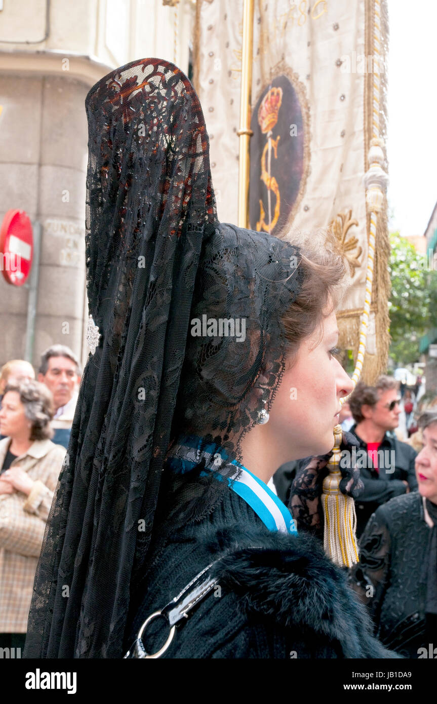 Woman wearing traditional Spanish mantilla in a Holy Week procession. Madrid, Spain. Stock Photo