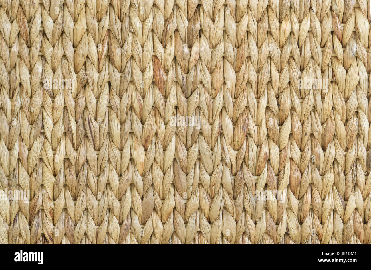 Meshwork of wooden reed wicker texture background Stock Photo