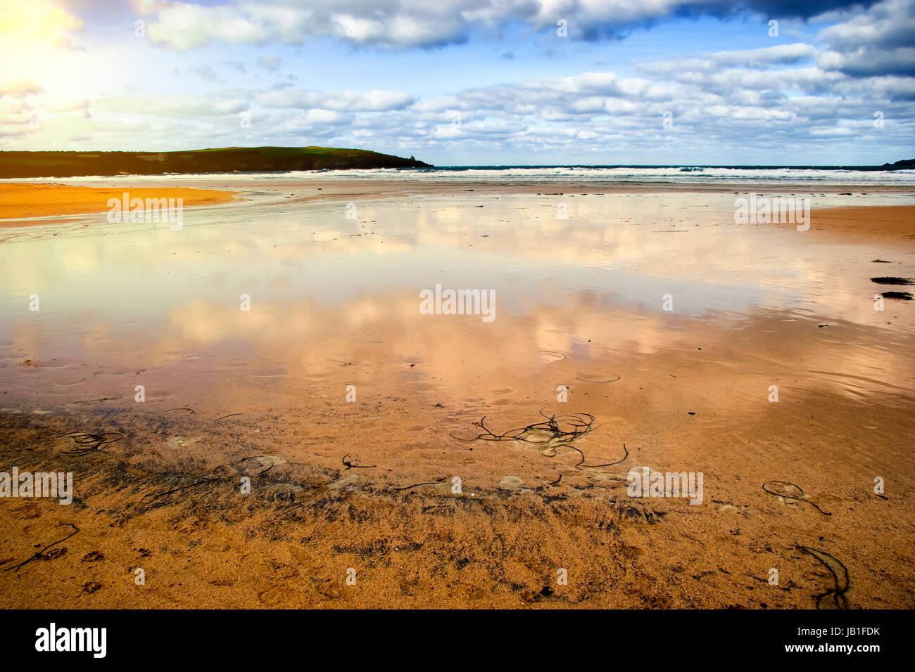 Early sunset on the beach at the surfing resort of Harlyn Bay, Cornwall, UK Stock Photo