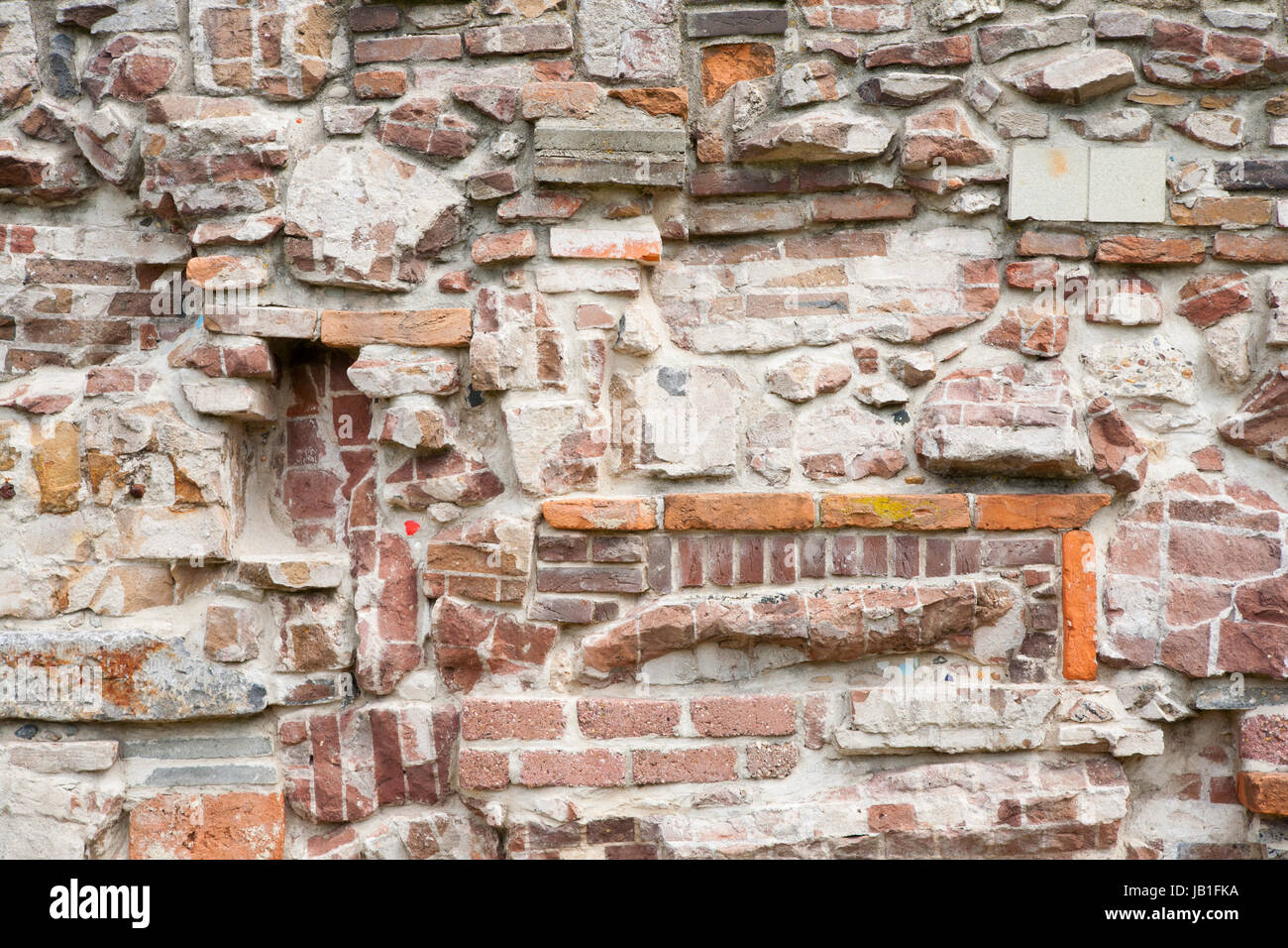 Brick Rcks Stone wall made of a variety of rocks and bricks Stock Photo - Alamy