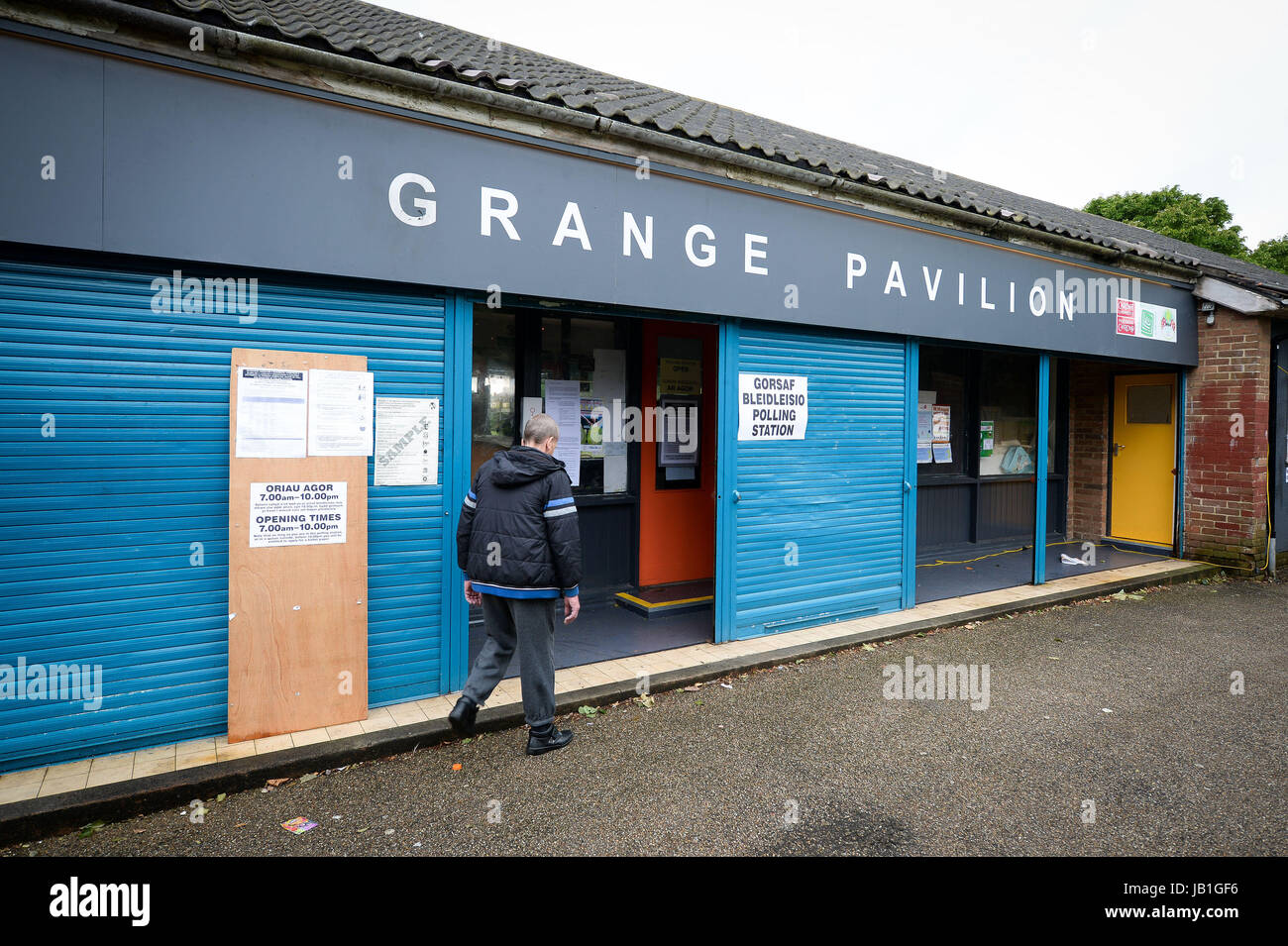 Voters arrive at the Grange Pavilion bowling club, which is a polling station in Grangetown, Cardiff, as voters head to the polls across the UK to vote in the General Election. Stock Photo