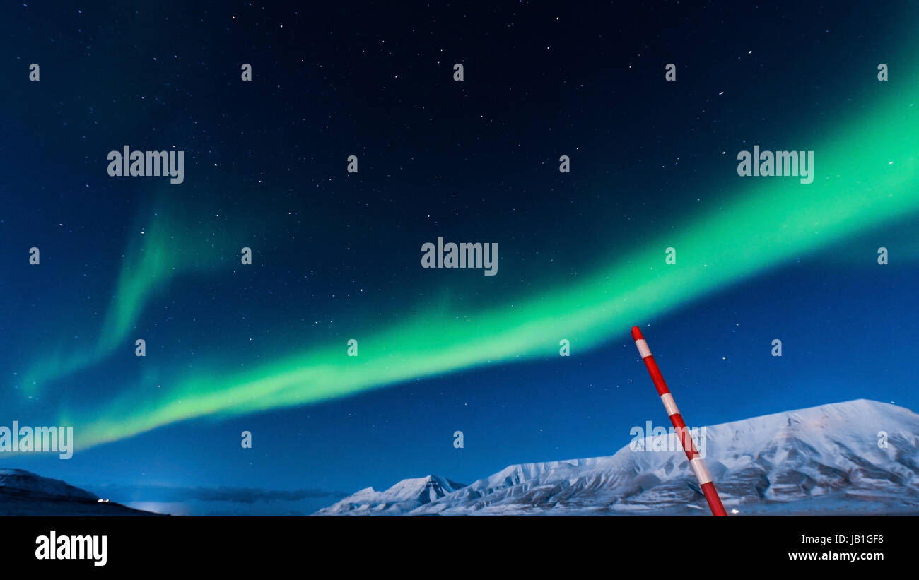 The polar Northern lights in Norway Svalbard in the mountains Stock Photo -  Alamy