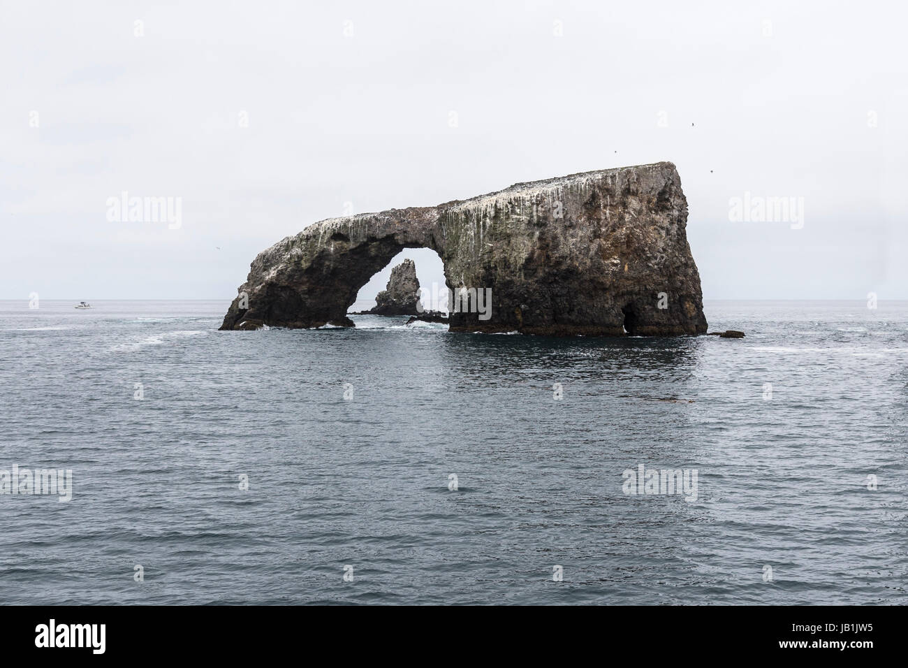 Anacapa island sea arch with cloud sky at Channel Islands National Park in Southern California. Stock Photo